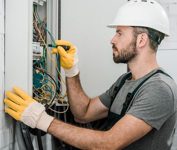 side-view-of-handsome-bearded-electrician-repairin-resize-pyzlpgdjenit98y5e15ehvpn4hpr2thdwyn7dp76jw